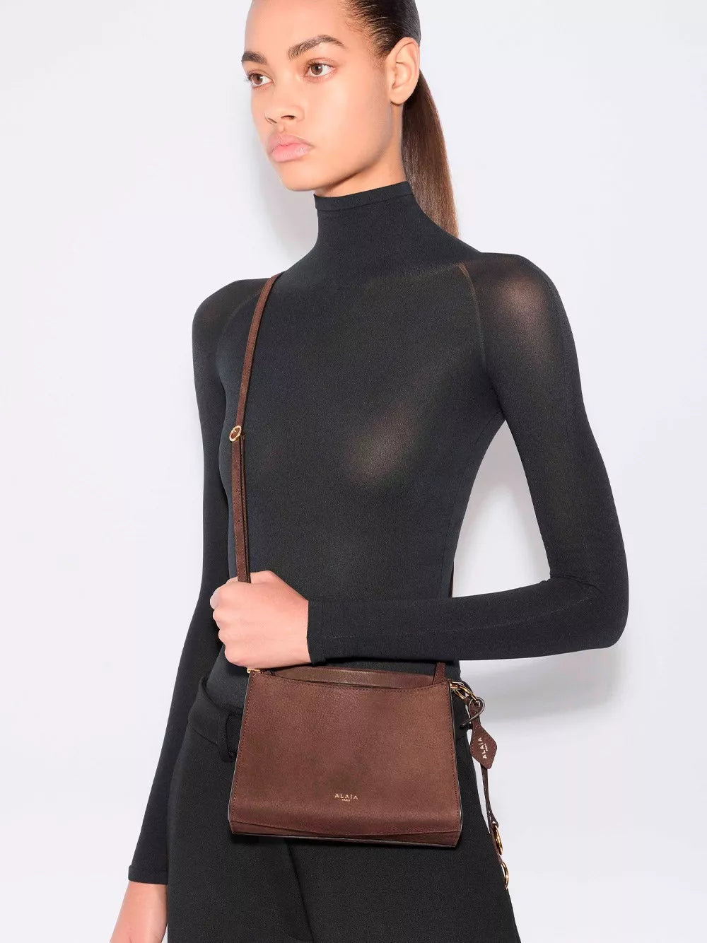 le click small square bag in nubuck