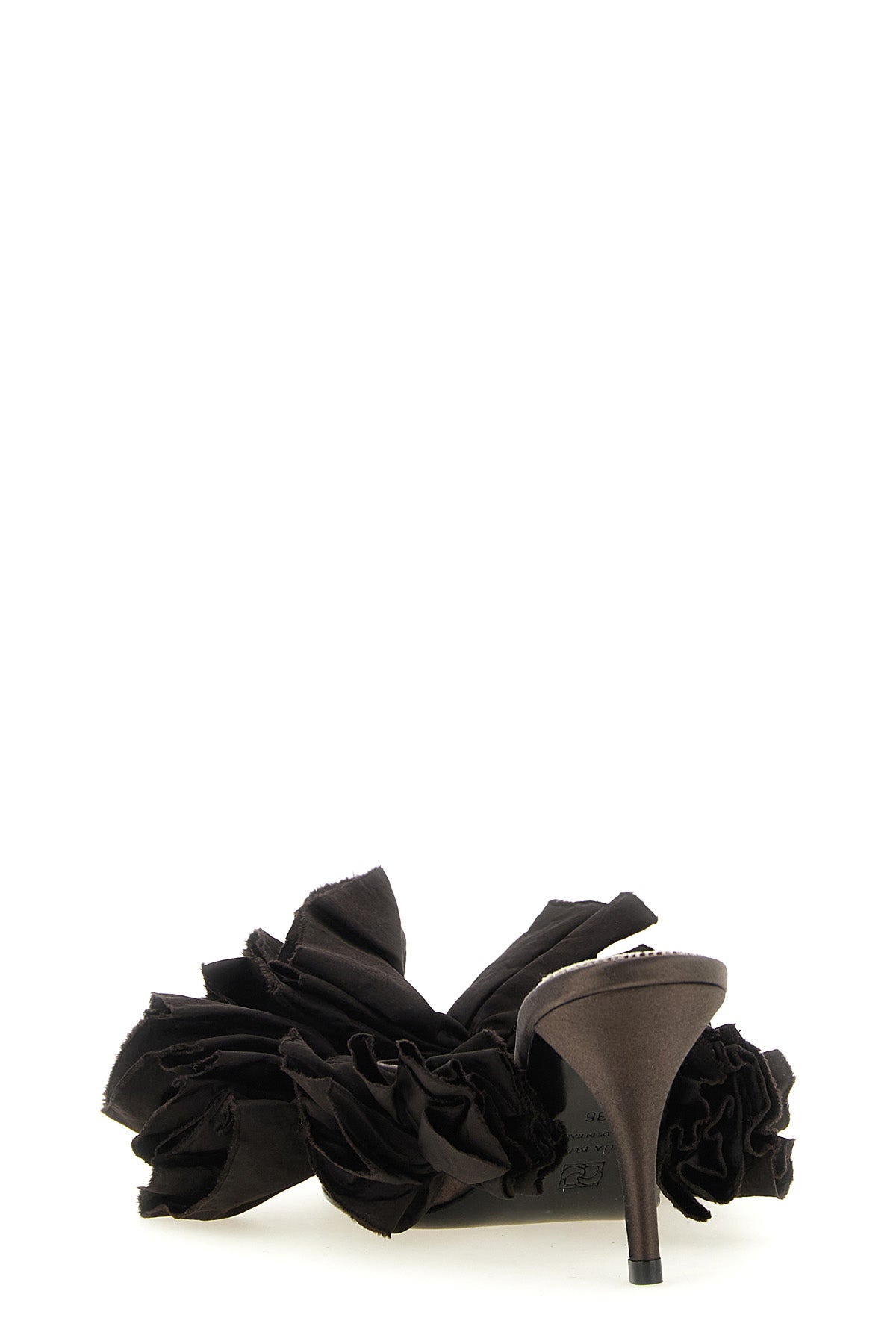 magda butrym mules redefine evening elegance through sculptural volumes and sart