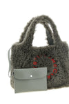 the stella mccartney tote bag redefines everyday volumes through a soft teddy-ef