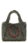 the stella mccartney tote bag redefines everyday volumes through a soft teddy-ef