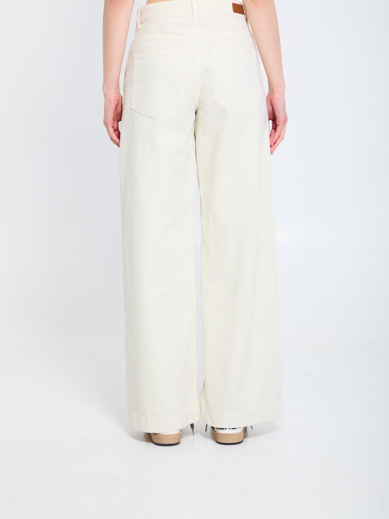 MONCLER 38 cotton pants with leather logo.