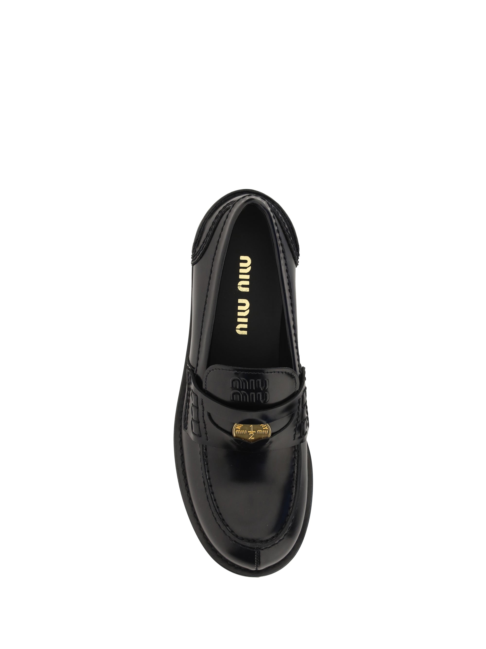 MIU MIU 38.5 penny loafers