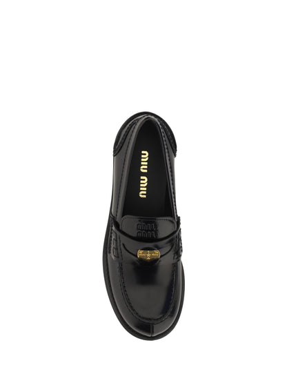 MIU MIU 38.5 penny loafers