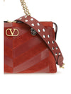 medium chevron pattern panthea shoulder bag