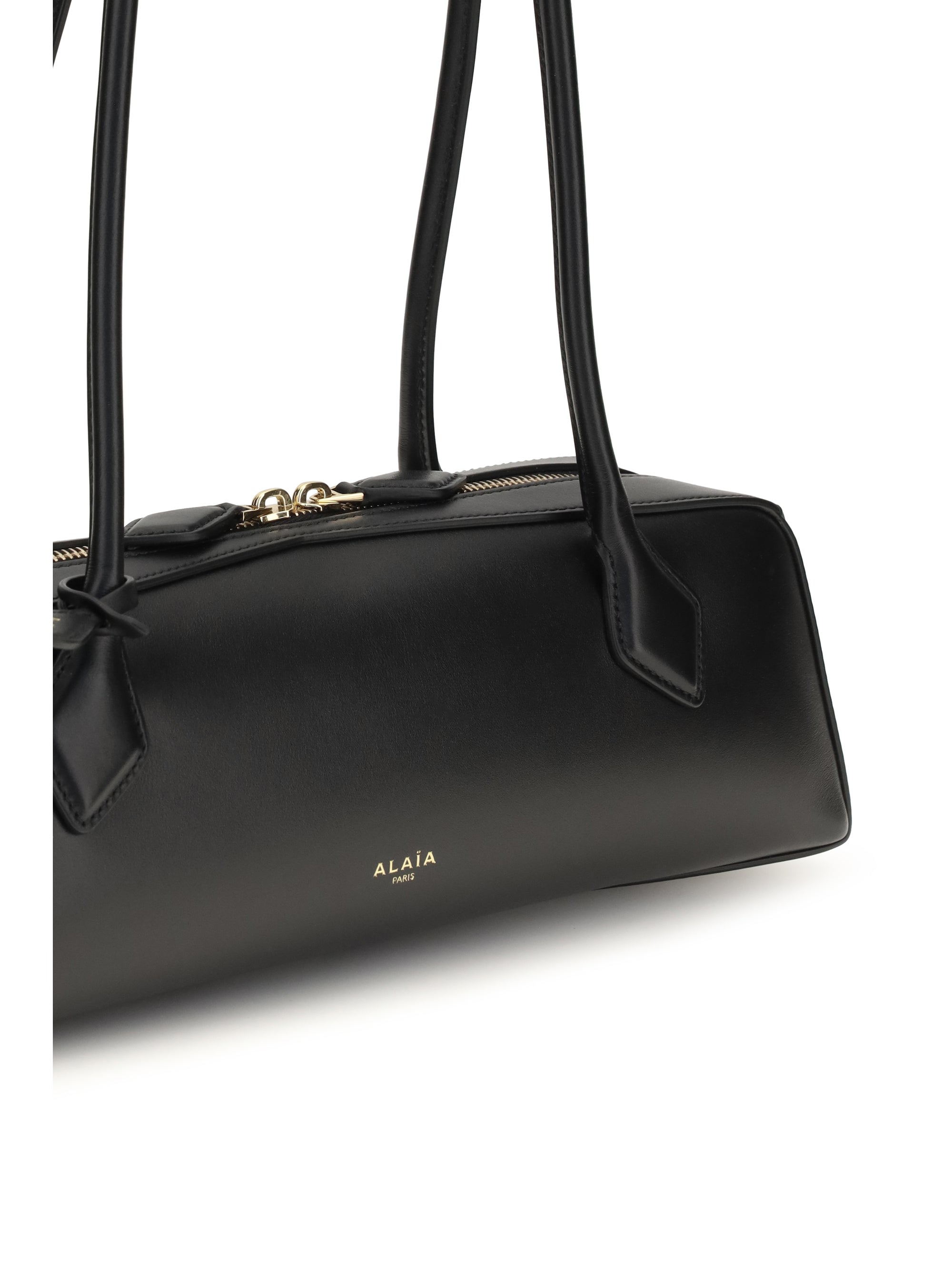 small le teckel shoulder bag