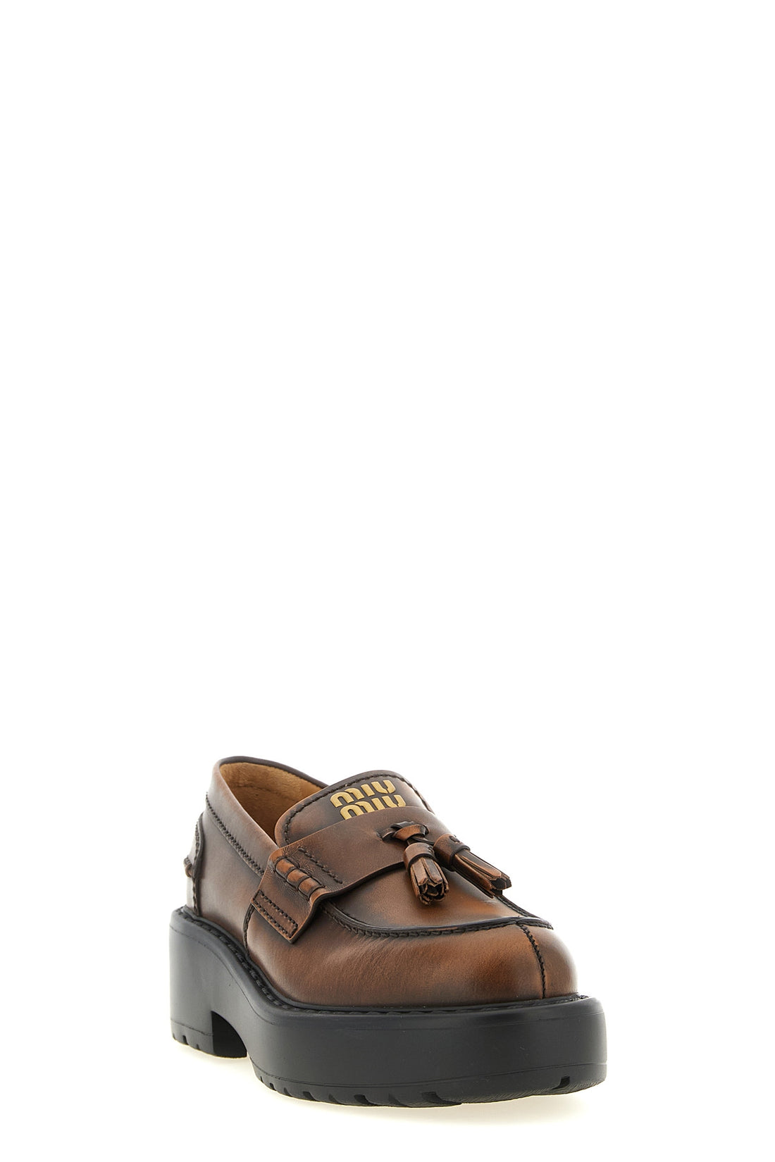 MIU MIU 35.5 miu miu loafers redefine classic footwear through a structural and bold lens