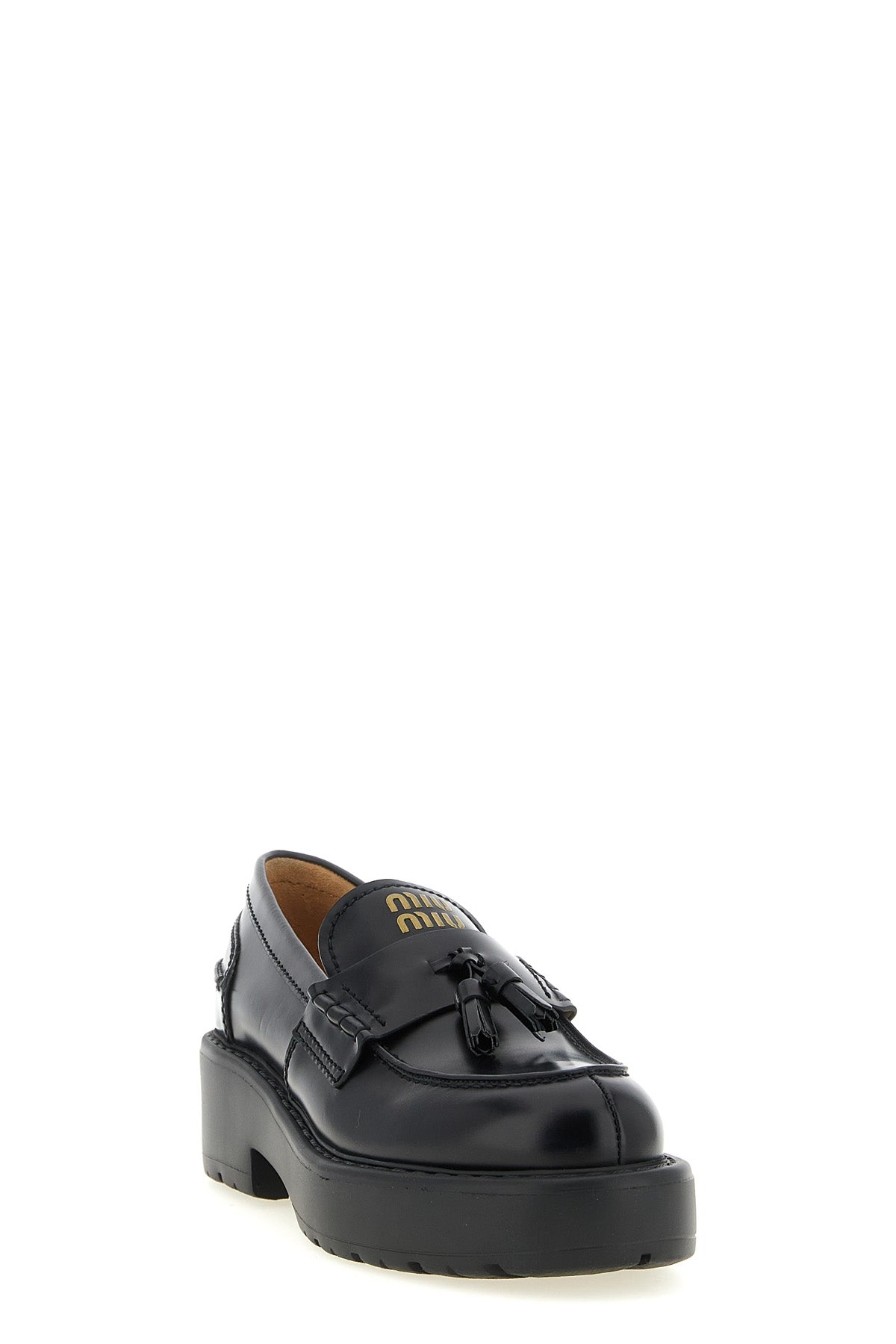 miu miu loafers in fine black calf leather reinterpret a wardrobe classic throug