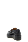 miu miu loafers in fine black calf leather reinterpret a wardrobe classic throug