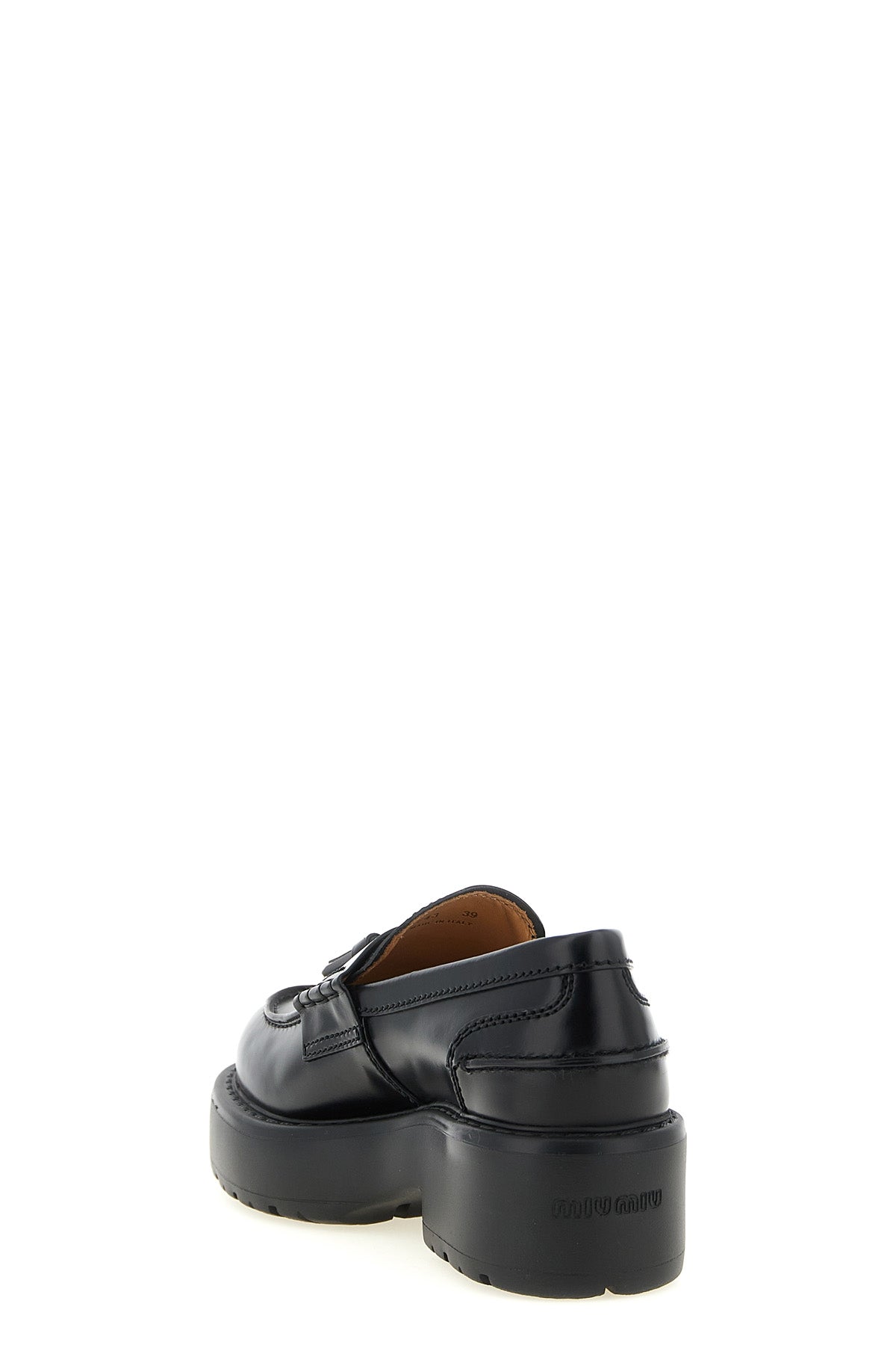 miu miu loafers in fine black calf leather reinterpret a wardrobe classic throug