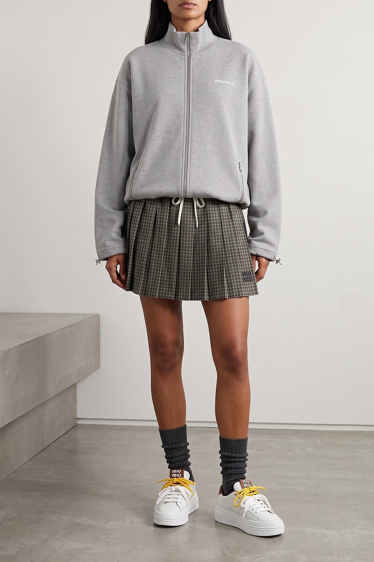 miu miu sneakers redefine the codes of sports footwear through a contemporary lu