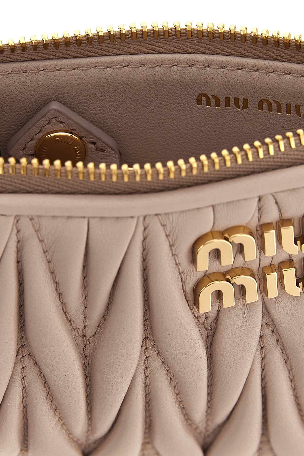the miu miu matelassé nappa leather card holder defines everyday elegance throug