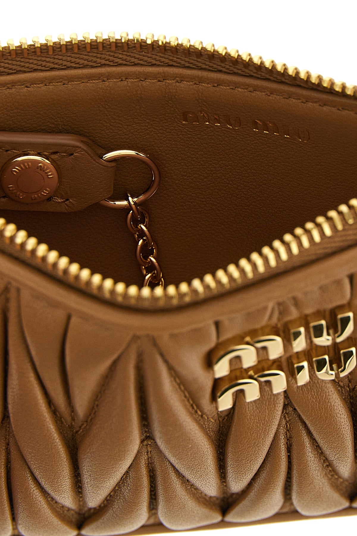 the miu miu card holder in fine nappa leather stands out for its iconic front ma
