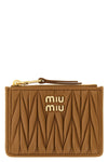 the miu miu card holder in fine nappa leather stands out for its iconic front ma