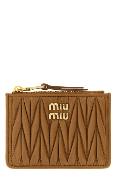 the miu miu card holder in fine nappa leather stands out for its iconic front ma