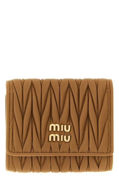 the miu miu small wallet in matelassé nappa leather represents the essence of th
