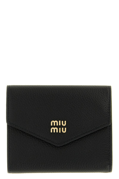 the miu miu compact black hammered leather wallet represents the essence of luxu