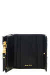 the miu miu small wallet in matelassé nappa leather is an essential accessory