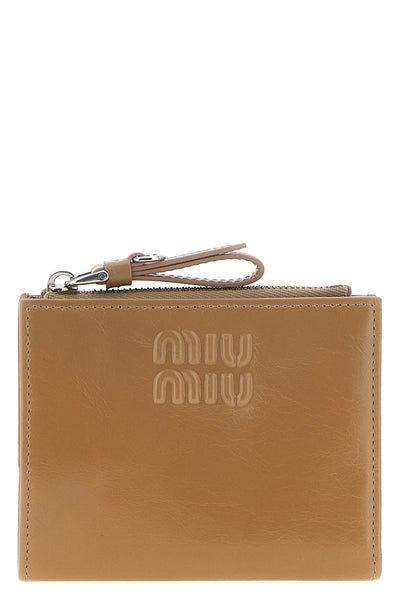 the miu miu small leather wallet embodies essential and sophisticated elegance