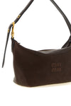 the miu miu aviator nappa pouch defines a compact hobo silhouette