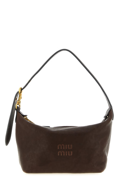 the miu miu aviator nappa pouch defines a compact hobo silhouette