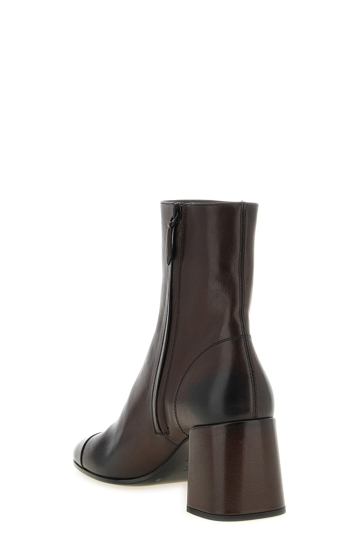 miu miu ankle boots redefine everyday elegance through a structured silhouette i