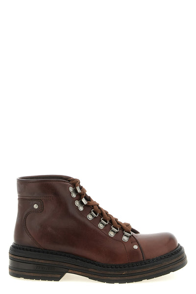 miu miu ankle boots reinterpret the aesthetics of the hiking world through a lux