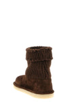 miu miu ankle boots reinterpret outdoor codes through a sophisticated material c