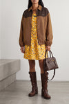 the miu miu sienna leather boot defines the silhouette through a knee structur