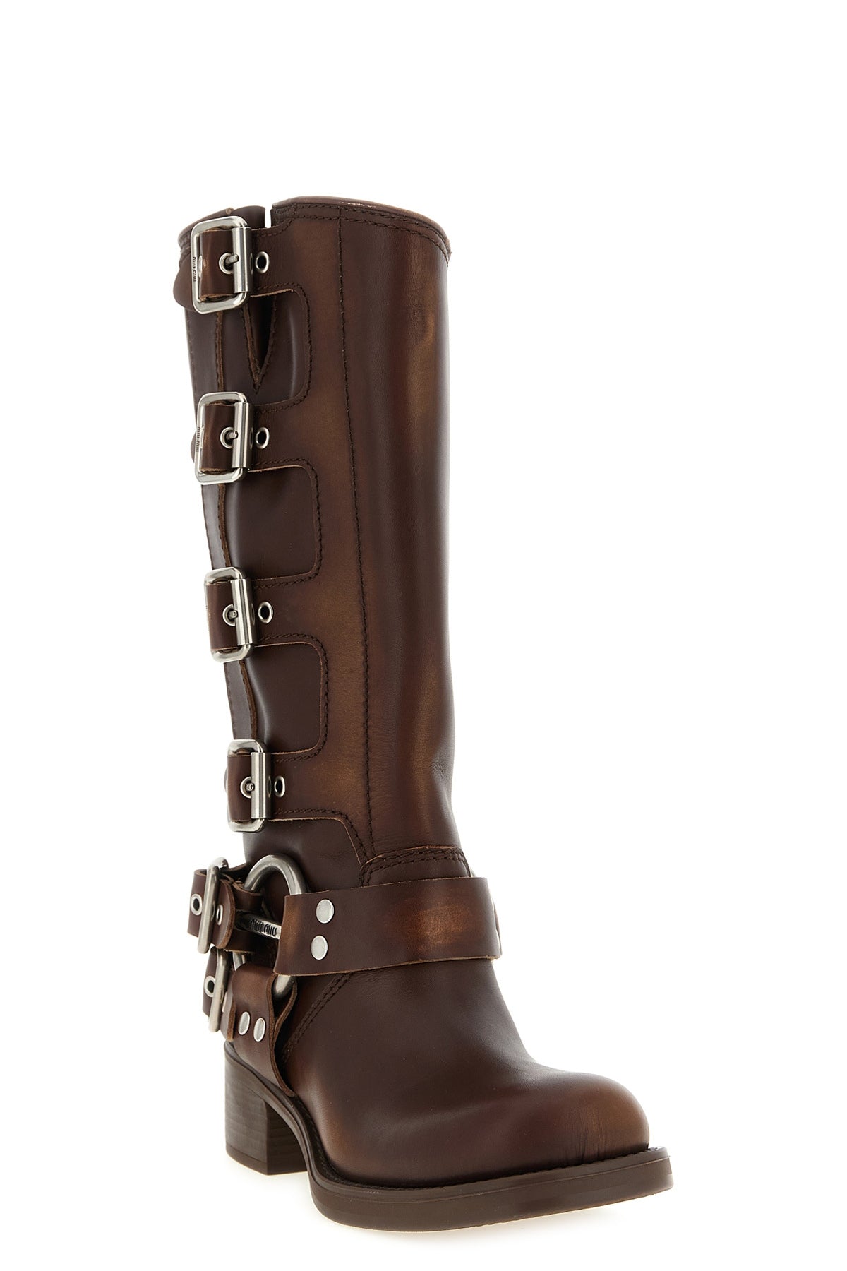 the miu miu sienna leather boot defines the silhouette through a knee structur
