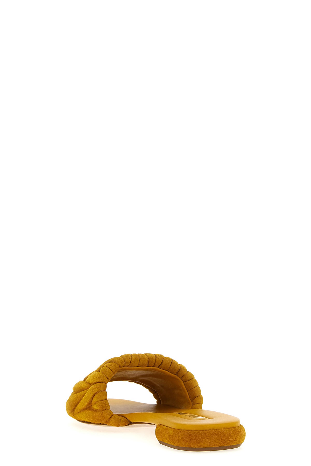 slides in matelassé suede