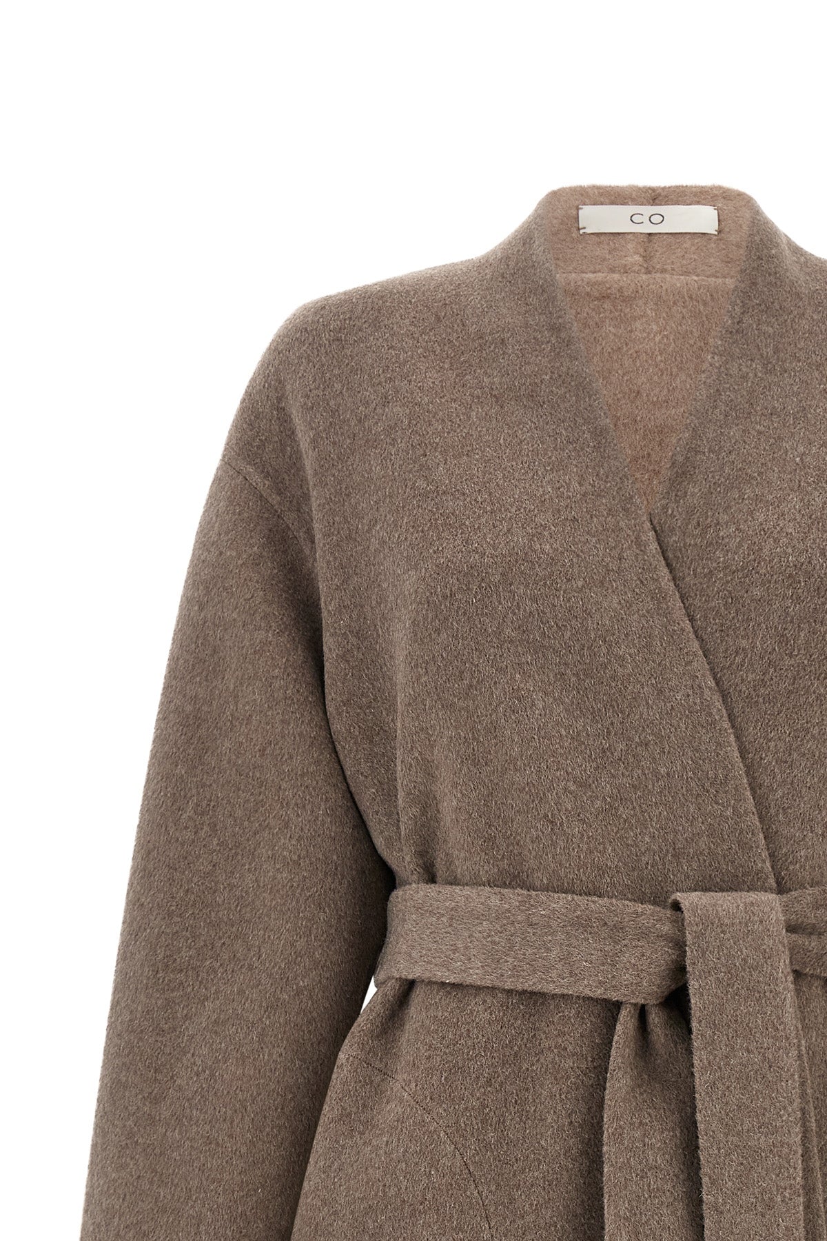 the coat of co defines a relaxed dressing gown silhouette through a sartorial co