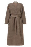 the coat of co defines a relaxed dressing gown silhouette through a sartorial co