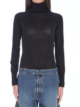 ALAIA 38 bodysuit in sheer knit