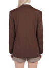 blazer over single-breasted frescolana