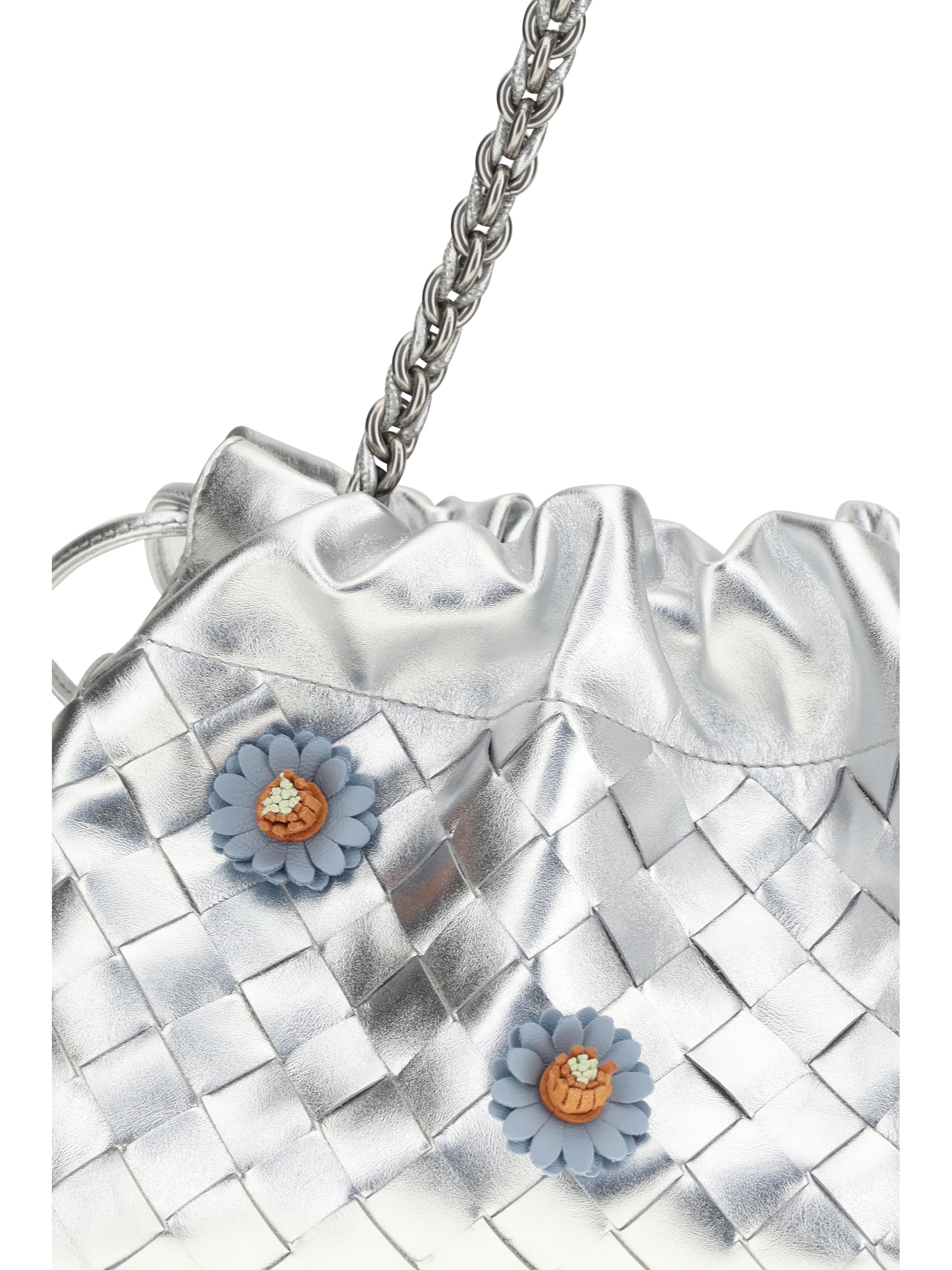 dustbag clutch bag with floral appliqués