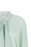 the stella mccartney shirt defines a fluid silhouette through its pure silk cons