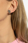 balenciaga bb xs stud lobe earrings redefine the codes of contemporary luxury