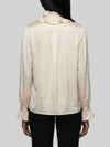 champagne ruffled shirt