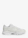 optical white runner sneakers