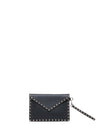 grainy calfskin rockstud pouch