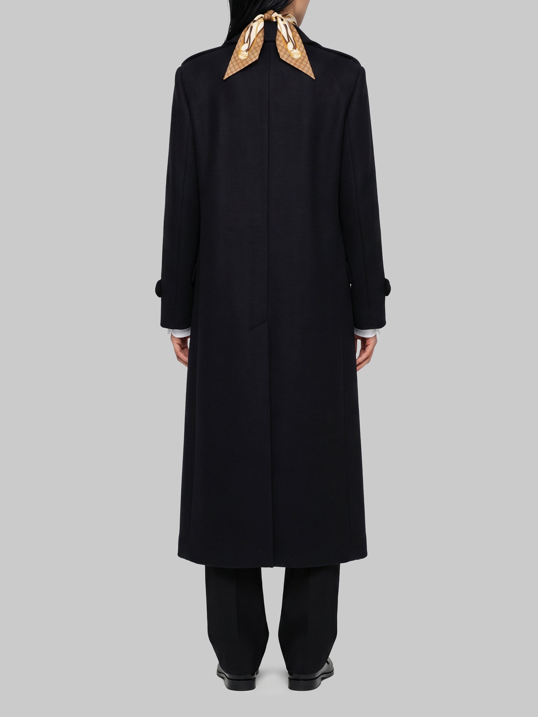 black double-breasted coat