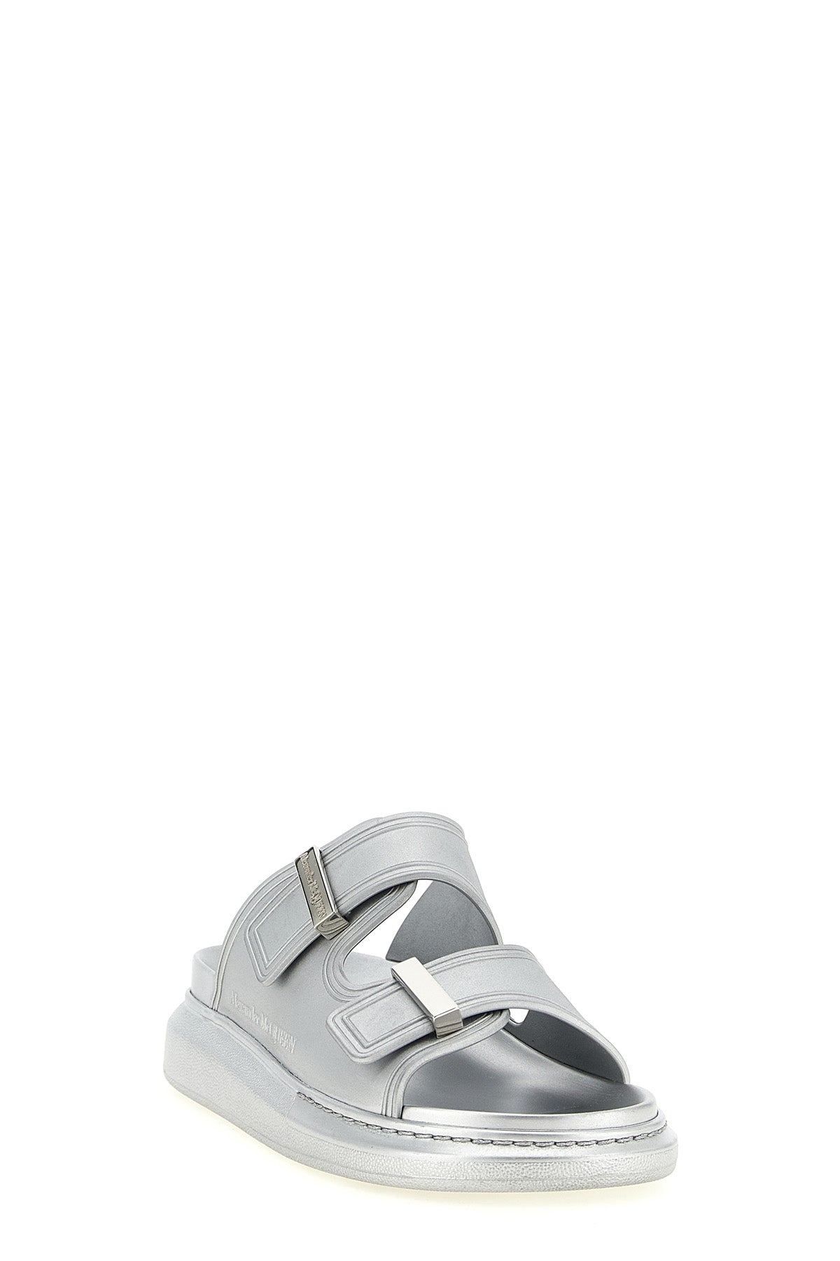 the alexander mcqueen hybrid slide sandal is defined by a sculptural pattern a