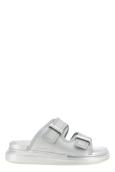 the alexander mcqueen hybrid slide sandal is defined by a sculptural pattern a