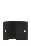 the gucci gg marmont mini wallet sets new standards of everyday luxury through a