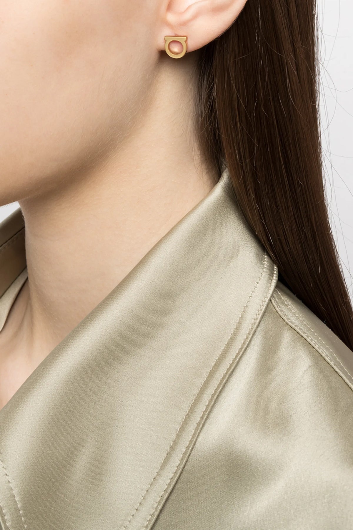 the ferragamo gancini piccoli earrings define a minimal aesthetic through cali