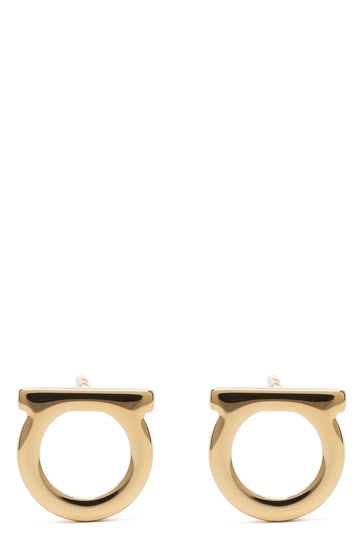 the ferragamo gancini piccoli earrings define a minimal aesthetic through cali