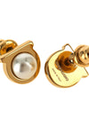 ferragamo earrings define the aesthetics of the brand through a compact and icon