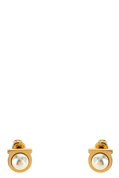ferragamo earrings define the aesthetics of the brand through a compact and icon