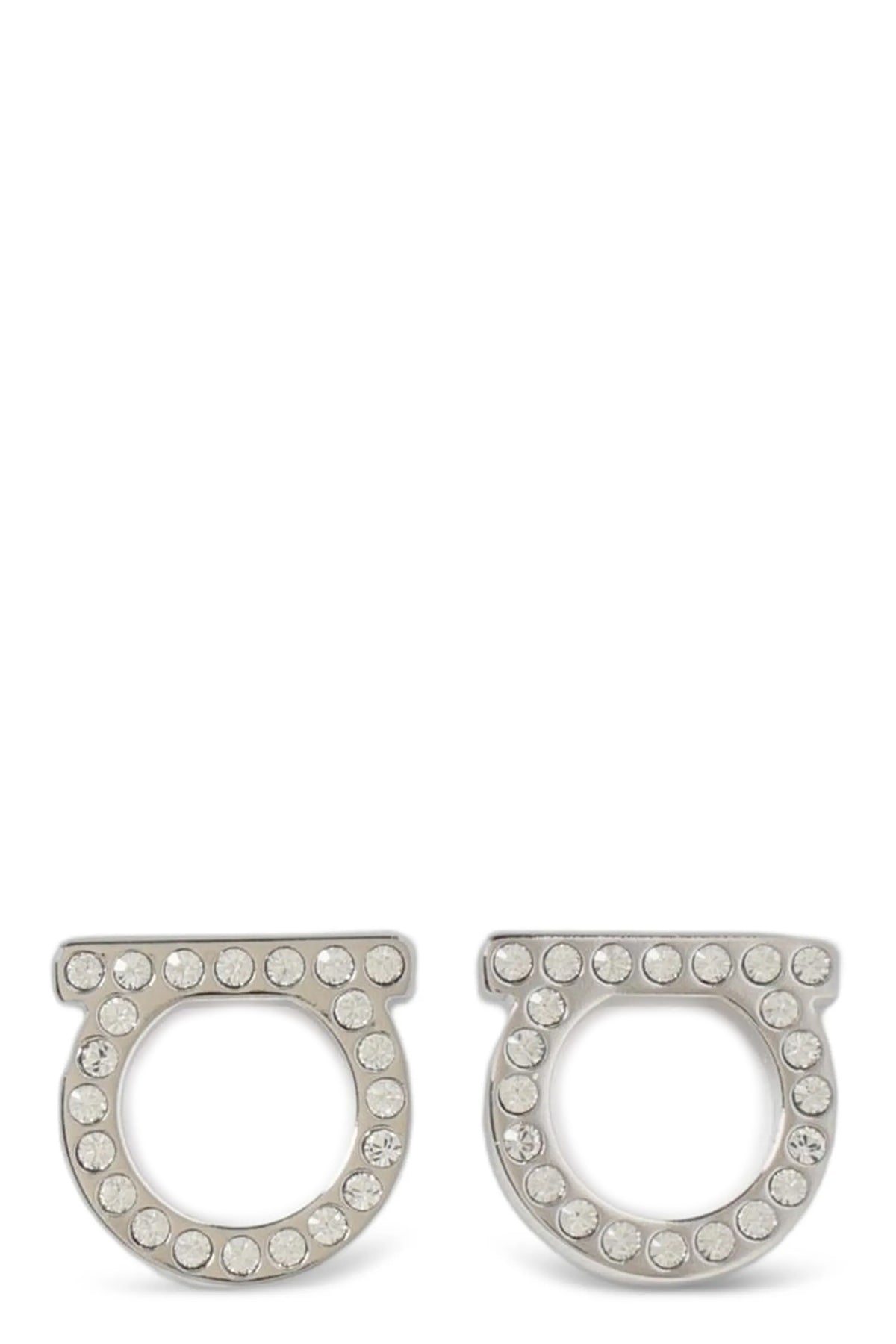 ferragamo gancini crystals earrings define the brands aesthetic through an ic