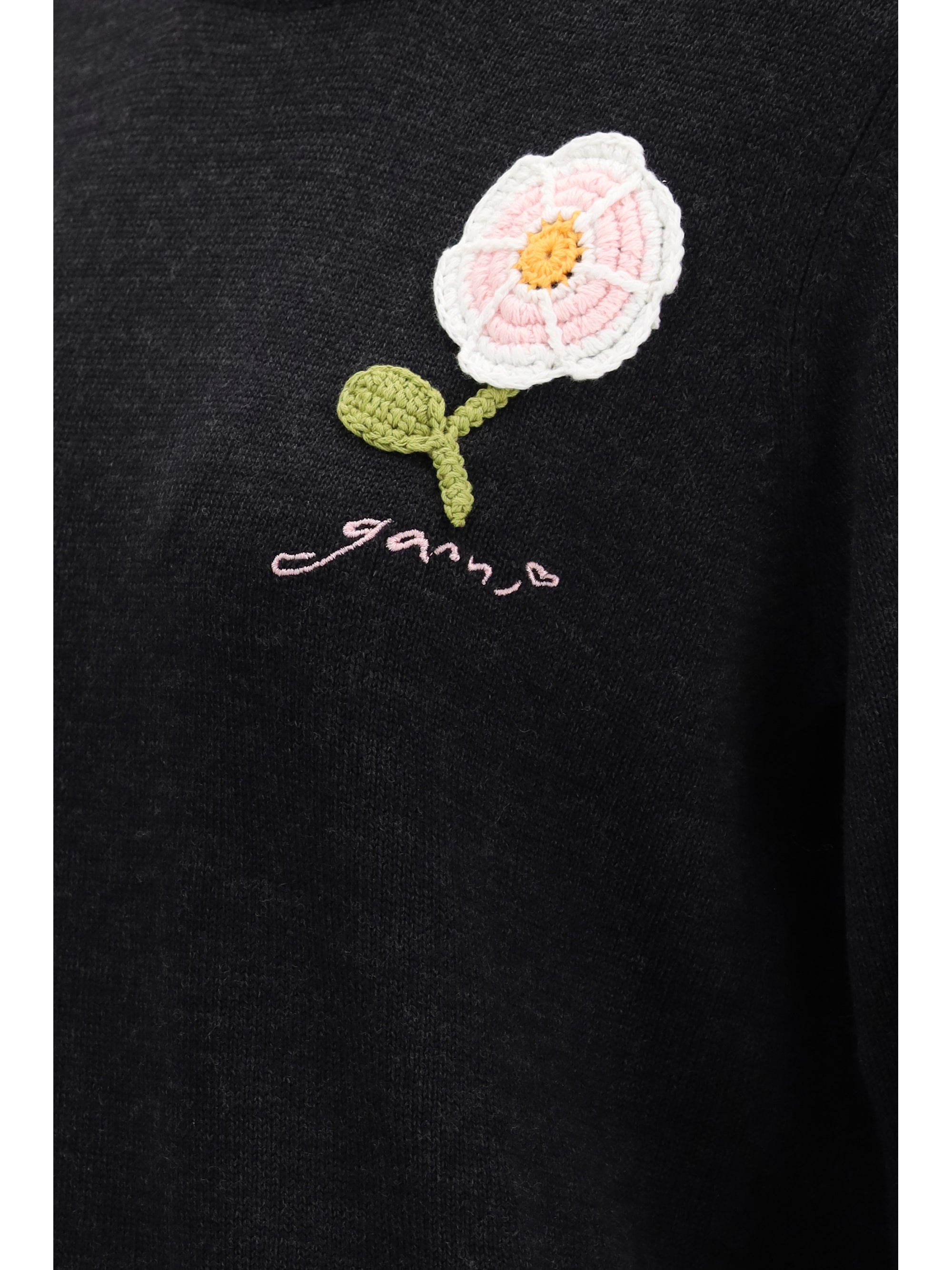 wool sweater with crochet flower